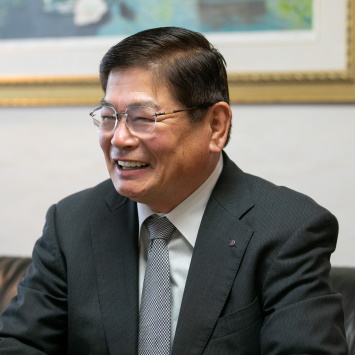 会長　飯田 貴司夫